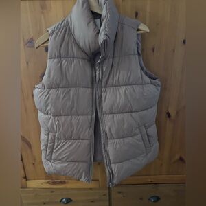 Puffer Vest in Dusty Purple.